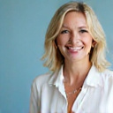 Portrait of happy client Sarah M.